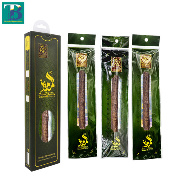 Three thick olive wood miswak sticks laid out on a white background, showcasing natural texture and fresh fiber ends.