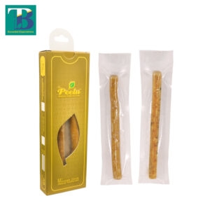 Two natural Peelu miswak sticks in eco-friendly packaging, ideal for traditional teeth cleaning.